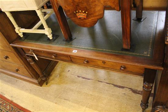 Victorian walnut/mahogany writing table, fitted green skiver